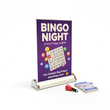 Load image into Gallery viewer, A Swift Desktop Banner with purple bingo branding on the small graphic with a bingo book laid next to it.